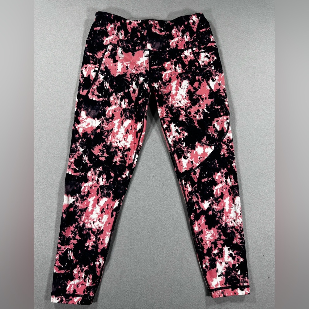 Women’s Sweaty Betty Pink and Navy workout leggings with side and back pocket